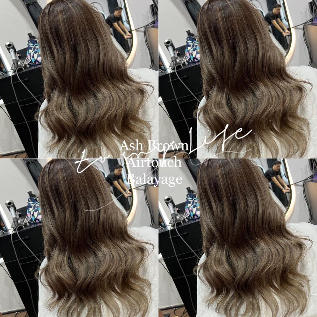 Airtouch balayage hairstyle with ash brown tones and soft waves in Singapore