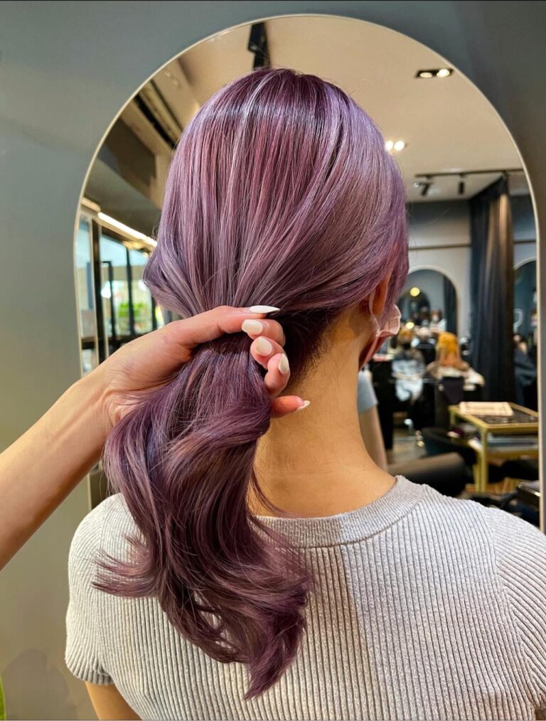 Pastel purple hair colour with soft curls styled at Singapore hair salon