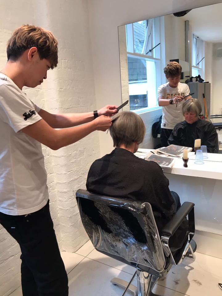 Women’s haircut in Singapore salon showing practical short hairstyle for humid weather